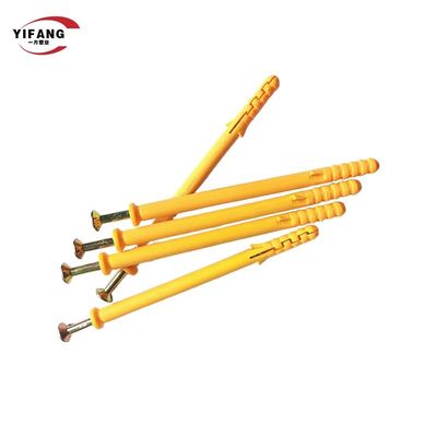 Τα κίτρινα μπλε ψάρια όπως τον πλαστικό ξηρό τοίχο αγκύρων επέκτασης βιδώνουν τα κοινά πρότυπα βουλωμάτων